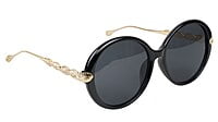 Female Oversized Round Sunglasses. Glossy Black Rim